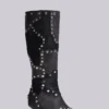 Bottes montant jusqu’aux genoux cloutées « Shadow »