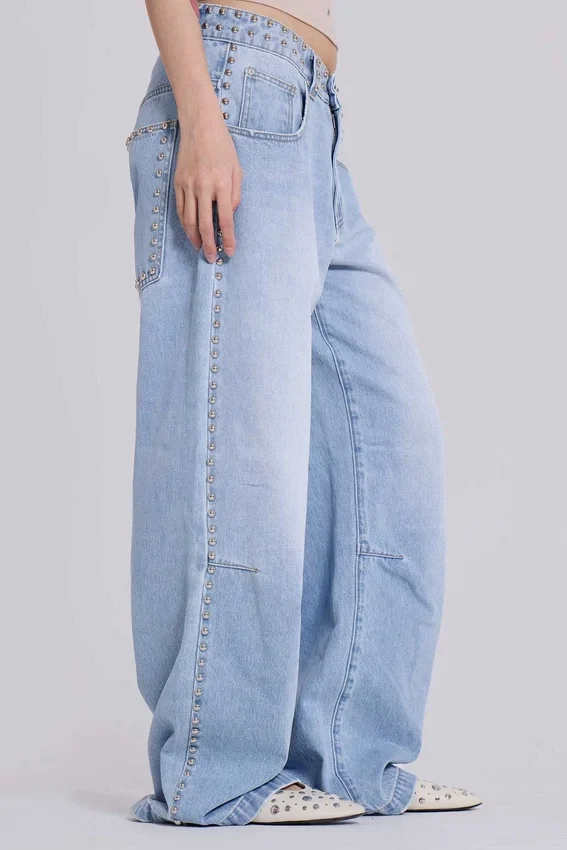 Colossus Jeans cloutés, délavage bleu clair