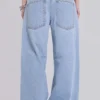 Colossus Jeans cloutés, délavage bleu clair