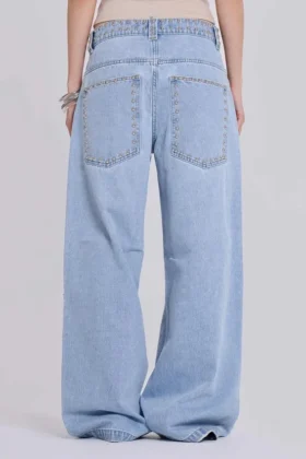 Colossus Jeans cloutés, délavage bleu clair