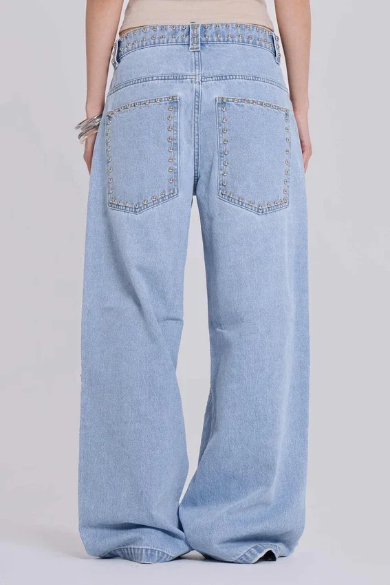 Colossus Jeans cloutés, délavage bleu clair
