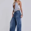 Colossus Jeans cloutés « Nailed » au délavage bleu moyen