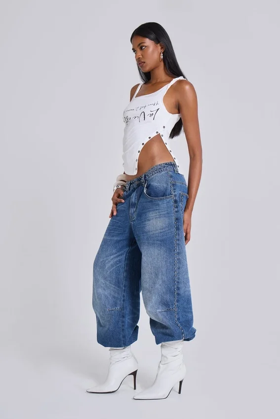 Colossus Jeans cloutés « Nailed » au délavage bleu moyen