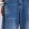 Colossus Jeans cloutés « Nailed » au délavage bleu moyen