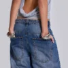 Colossus Jeans cloutés « Nailed » au délavage bleu moyen