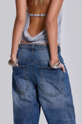 Colossus Jeans cloutés « Nailed » au délavage bleu moyen