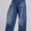 Colossus Jeans cloutés « Nailed » au délavage bleu moyen