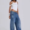Colossus Jeans cloutés « Nailed » au délavage bleu moyen