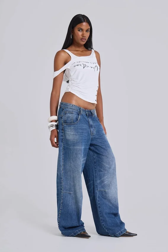 Colossus Jeans cloutés « Nailed » au délavage bleu moyen