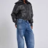 Colossus Jeans cloutés « Nailed » au délavage bleu moyen