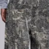 Colossus Jeans en camouflage Woodland à effet aiguilleté