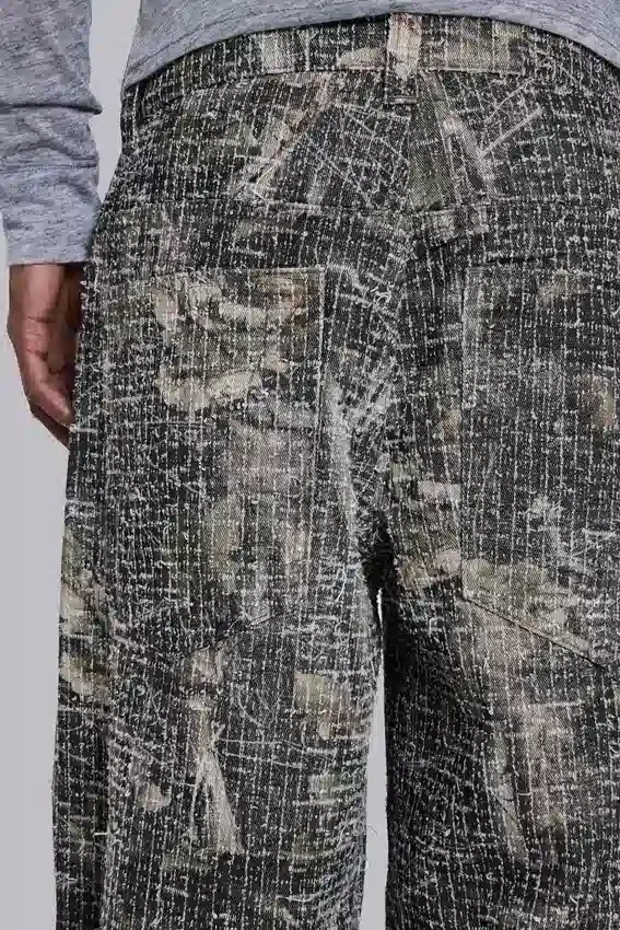 Colossus Jeans en camouflage Woodland à effet aiguilleté