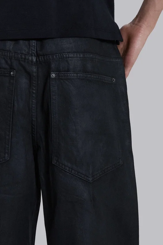 Colossus Jeans en denim enduit avec fermeture éclair