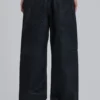 Colossus Jeans en denim enduit avec fermeture éclair