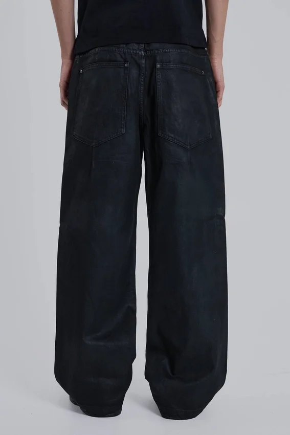Colossus Jeans en denim enduit avec fermeture éclair