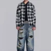 Colossus Jeans XL déchiré à motif camouflage caché