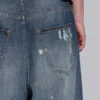 Colossus Jeans XL déchiré à motif camouflage caché