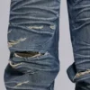 Colossus Jeans XL déchiré à motif camouflage caché