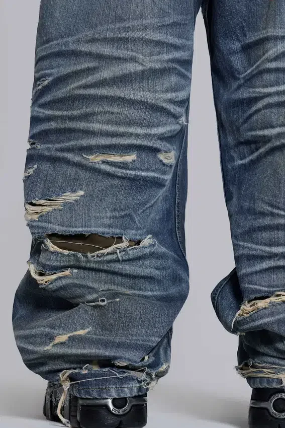 Colossus Jeans XL déchiré à motif camouflage caché