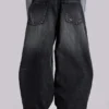 Colossus Jeans XL délavé et orné de chaînes