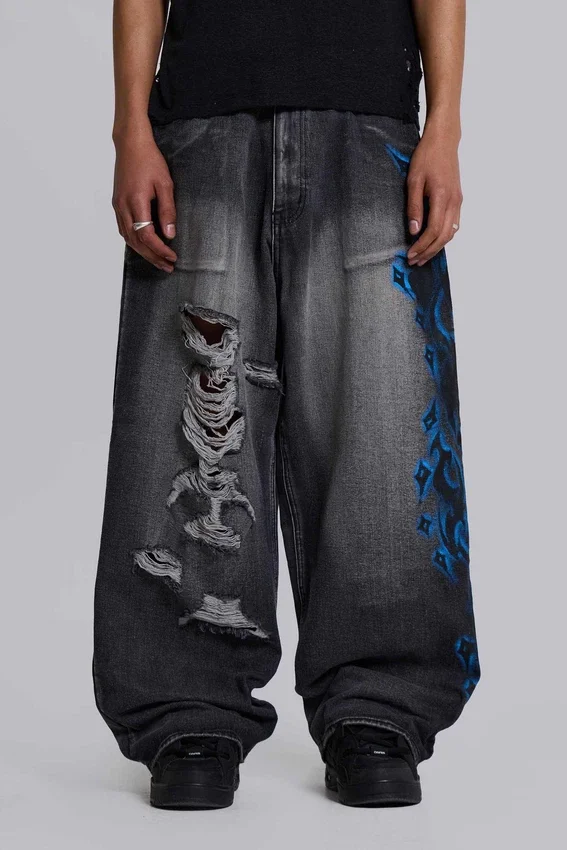 Colossus Jeans XL noir déchiré avec motif Spike Airbrush