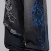 Colossus Jeans XL noir déchiré avec motif Spike Airbrush