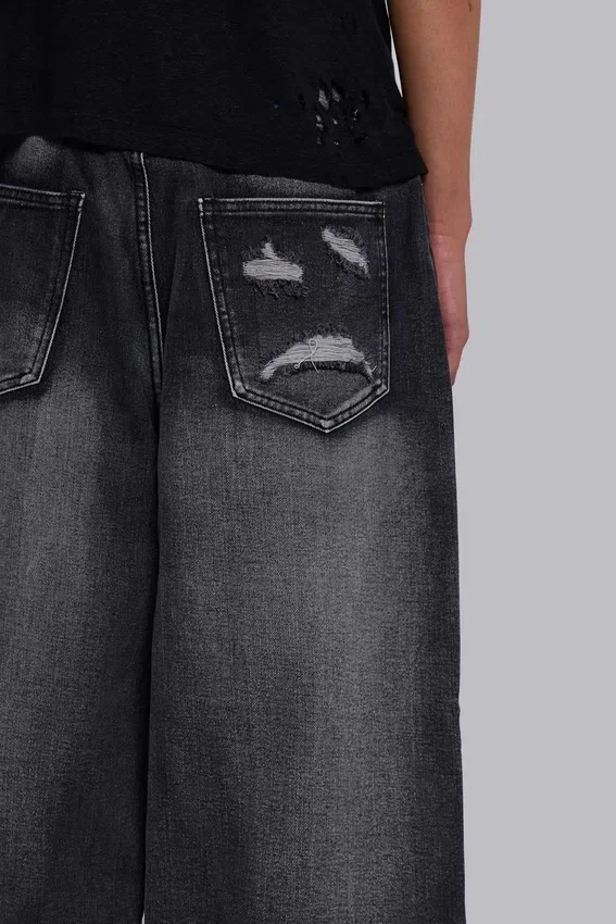 Colossus Jeans XL noir déchiré avec motif Spike Airbrush