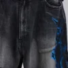 Colossus Jeans XL noir déchiré avec motif Spike Airbrush