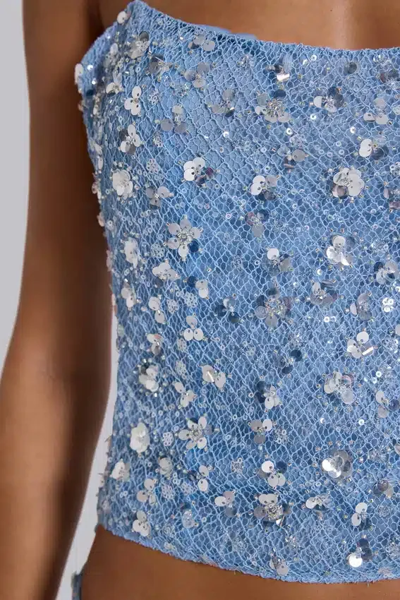 Haut corset en maille à paillettes Deva, couleur « Sky »