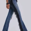 Jeans bootcut à franges El Topo, délavage bleu