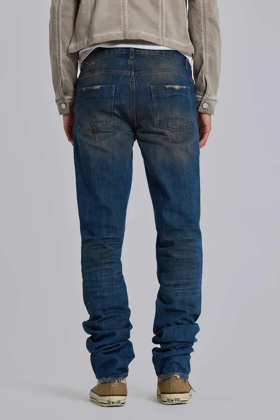 Jeans « Drain » délavés sales