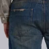 Jeans « Drain » délavés sales