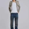 Jeans « Drain » délavés sales