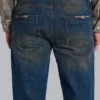 Jeans « Drain » délavés sales