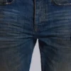 Jeans « Drain » délavés sales