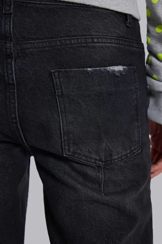 Jeans « Drain » noir délavé