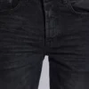 Jeans « Drain » noir délavé
