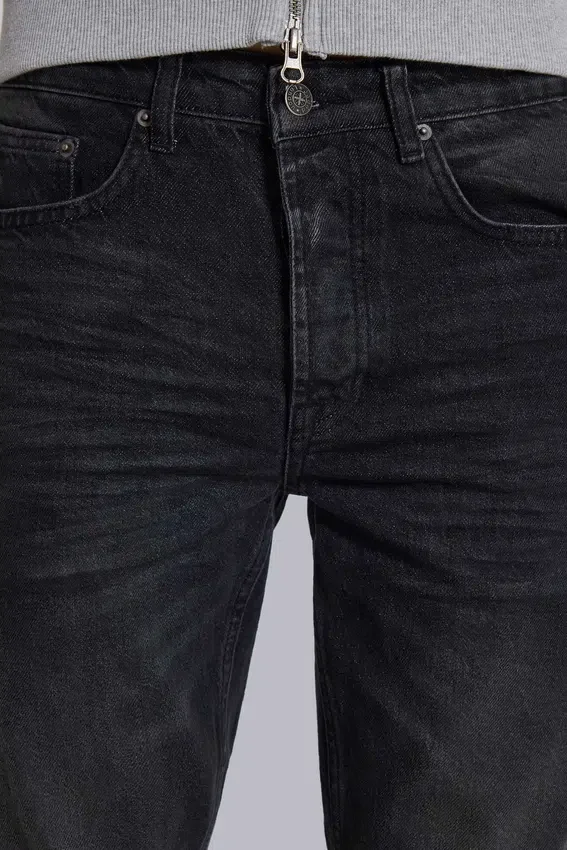 Jeans « Drain » noir délavé