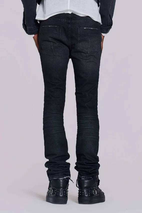 Jeans « Drain » noir délavé