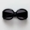 Lunettes de soleil rondes oversize Majorette en noir
