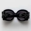 Lunettes de soleil rondes oversize Majorette en noir