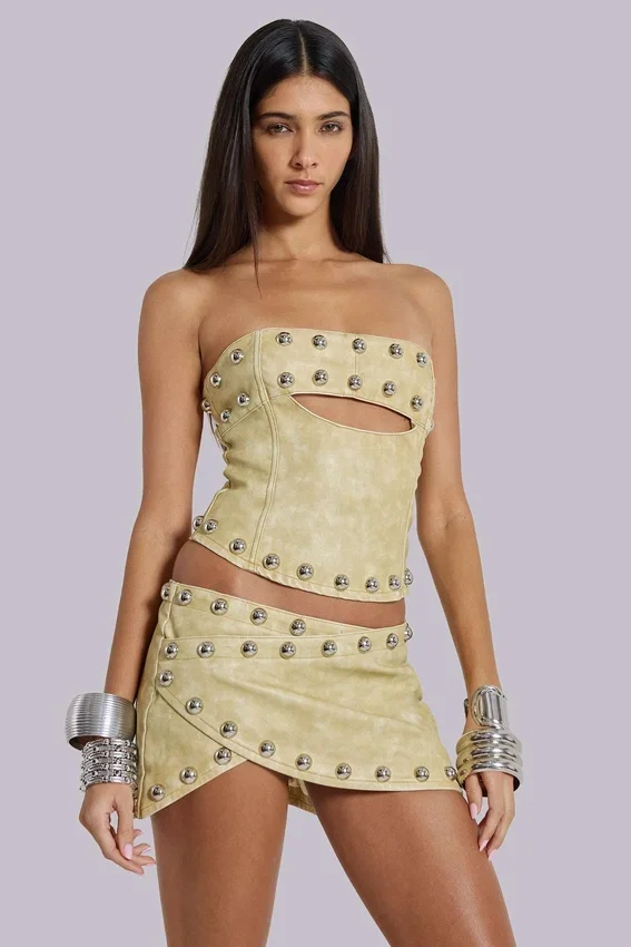 Mini-jupe cloutée en cuir synthétique Vinta