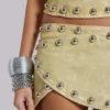 Mini-jupe cloutée en cuir synthétique Vinta