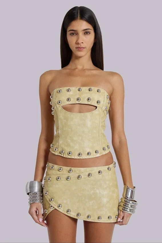 Mini-jupe cloutée en cuir synthétique Vinta