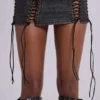 Mini-robe Odile en simili cuir noir à lacets