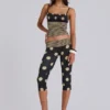 Pantalon capri Lola à revers, à rayures et pois