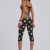 Pantalon capri Lola à revers, à rayures et pois