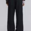 Pantalon de costume bootcut noir à coupe ajustée
