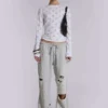 Pantalon de jogging bootcut ample et vieilli « Cleo »