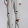 Pantalon de jogging bootcut ample et vieilli « Cleo »
